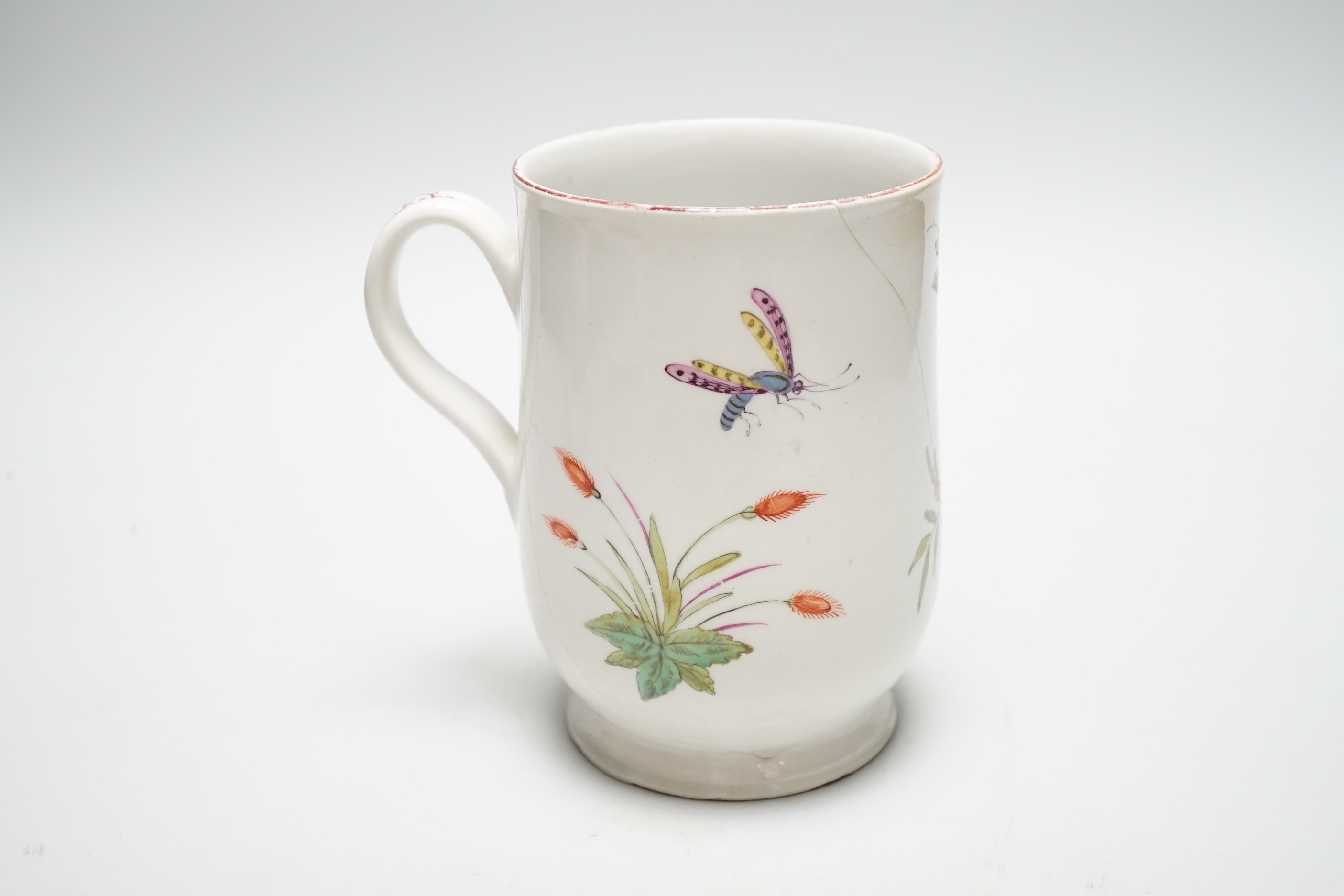 A large 18th century Bow ‘Fantastic Birds’ porcelain mug, 15cm (a.f)